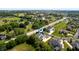 Scenic aerial view of a residential area featuring well-maintained homes and lush greenery at 3853 Abney Highland Dr, Zionsville, IN 46077