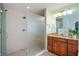 This bathroom features a tiled shower, granite countertop vanity, and modern fixtures at 3853 Abney Highland Dr, Zionsville, IN 46077