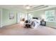 Spacious main bedroom with tray ceiling, and ensuite bathroom access, offering a comfortable retreat at 3853 Abney Highland Dr, Zionsville, IN 46077