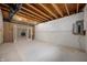 Spacious unfinished basement, ideal for storage or future expansion with walkout entrance at 3853 Abney Highland Dr, Zionsville, IN 46077