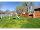 Backyard features a swingset, a slide, and access to the back deck at 40 S Restin Rd, Greenwood, IN 46142
