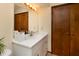 Bright bathroom featuring a modern vanity, stylish fixtures, and ample storage space at 40 S Restin Rd, Greenwood, IN 46142