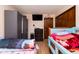 Spacious bedroom with television, wardrobe, and comfortable beds at 40 S Restin Rd, Greenwood, IN 46142
