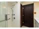 Shower featuring a grab bar, and multiple showerheads for an accessible design at 40 S Restin Rd, Greenwood, IN 46142