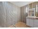 Unfinished bathroom with exposed framing and a white vanity at 402 W Clinton St, Danville, IN 46122