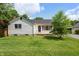 Charming single-story home with a well-maintained lawn and inviting curb appeal at 402 W Clinton St, Danville, IN 46122