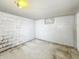 Unfinished basement featuring concrete walls, window, with exposed pipes at 405 Harlan St, Indianapolis, IN 46201