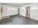 This living room offers a spacious layout and lots of natural light at 405 Harlan St, Indianapolis, IN 46201