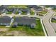 Overhead shot of a home's backyard featuring a covered patio with chairs, and beautifully green lawn at 4182 Hume Ave, Plainfield, IN 46168