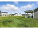 Spacious backyard with covered patio and well-maintained lawn at 4182 Hume Ave, Plainfield, IN 46168