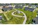 Community outdoor space and walking path, surrounded by neatly manicured lawns and beautiful landscaping at 4182 Hume Ave, Plainfield, IN 46168