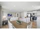 Spacious living area connecting the dining area and kitchen, perfect for entertaining guests at 4182 Hume Ave, Plainfield, IN 46168
