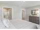Spacious bedroom with soft carpet and en suite bathroom access featuring glass shower doors at 4182 Hume Ave, Plainfield, IN 46168