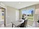 Well-lit office featuring a contemporary desk, comfortable chair, and neighborhood views at 4182 Hume Ave, Plainfield, IN 46168