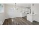 Open dining and kitchen area with modern finishes and abundant natural light at 4337 N Audubon Rd, Indianapolis, IN 46226