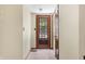 Hallway with carpet, light walls, and access to other rooms of the home at 5052 Helmsburg School Rd, Morgantown, IN 46160