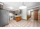 The kitchen is equipped with stainless steel appliances and has a peninsula countertop at 5052 Helmsburg School Rd, Morgantown, IN 46160