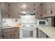 This kitchen features standard appliances, ample cabinet space, and efficient layout at 5052 Helmsburg School Rd, Morgantown, IN 46160