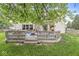 Charming deck area for outdoor gatherings and relaxation in a serene setting at 5299 Breakers Way, Carmel, IN 46033
