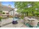 Well-maintained back deck with a pergola and outdoor seating, perfect for entertaining at 5299 Breakers Way, Carmel, IN 46033