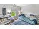 Bedroom featuring decor, neutral paint, and view of the outdoors through the window at 5299 Breakers Way, Carmel, IN 46033