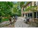 Backyard boasts a patio and well-manicured lawn perfect for entertaining guests at 5720 Hickory Hollow Dr, Plainfield, IN 46168
