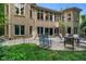 The brick home features a stone patio and lawn at 5720 Hickory Hollow Dr, Plainfield, IN 46168