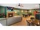 Basement with a fireplace, pool table, wet bar, and dining area, perfect for entertaining at 5720 Hickory Hollow Dr, Plainfield, IN 46168