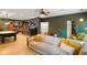 Basement featuring a pool table, wet bar, dining area, and a comfortable seating area at 5720 Hickory Hollow Dr, Plainfield, IN 46168