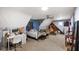 Spacious bedroom featuring a desk, bed, couch and ceiling fan at 5720 Hickory Hollow Dr, Plainfield, IN 46168