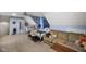 Charming bedroom featuring a seating area, sloped ceilings, and a ceiling fan at 5720 Hickory Hollow Dr, Plainfield, IN 46168
