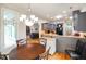 Dining room leading into the kitchen, offering an open view to a comfortable living space at 5720 Hickory Hollow Dr, Plainfield, IN 46168