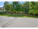 The home sits on a hill surrounded by mature trees at 5720 Hickory Hollow Dr, Plainfield, IN 46168