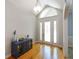 Bright foyer with hardwood floors, high ceilings, and an elegant entryway at 5720 Hickory Hollow Dr, Plainfield, IN 46168