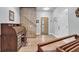 Inviting entryway with natural light, hardwood floors, and stylish decor at 5903 Birchwood Ave, Indianapolis, IN 46220