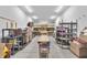 Spacious garage featuring ample storage space, workbenches, and shelving at 5903 Birchwood Ave, Indianapolis, IN 46220