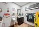 Unique half-bathroom featuring sports-themed decor and a modern vanity at 6420 Colt Ln, Anderson, IN 46013
