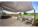 Outdoor patio featuring comfortable seating, a fire pit, and a hot tub at 6420 Colt Ln, Anderson, IN 46013