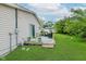 A charming deck with outdoor seating and garden with a sliding door access at 6550 Reed Rd, Pittsboro, IN 46167