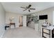 Bright bedroom featuring neutral walls, carpet, and a ceiling fan at 6550 Reed Rd, Pittsboro, IN 46167