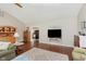Open-concept living area with hardwood floors, connecting seamlessly to the kitchen, perfect for modern living at 6550 Reed Rd, Pittsboro, IN 46167