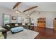 Spacious living area with hardwood floors, high ceilings, and an open layout ideal for gatherings at 6550 Reed Rd, Pittsboro, IN 46167