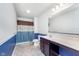 Full bathroom, with shower and toilet, with vanity and decorative brown and blue color theme at 6589 Kara Ln, Brownsburg, IN 46112