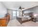 Charming main bedroom with a large bed and a pleasant view from the window at 6589 Kara Ln, Brownsburg, IN 46112