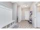Practical mudroom with built-in bench, storage, and access to the garage at 6589 Kara Ln, Brownsburg, IN 46112