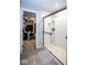 Beautiful bathroom features a large walk-in shower with a bench and a walk-in closet at 7128 Verwood Ct, Plainfield, IN 46168