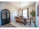 Elegant dining room with modern lighting, comfortable seating, and tasteful decor for memorable gatherings at 7128 Verwood Ct, Plainfield, IN 46168