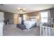 Spacious main bedroom is complete with a ceiling fan, an ensuite bathroom, and neutral decor at 7128 Verwood Ct, Plainfield, IN 46168