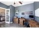 Stylish home office featuring hardwood floors, custom desk and a white board for notes at 7128 Verwood Ct, Plainfield, IN 46168