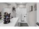 Bright bathroom features double sinks with framed mirror and large glass shower enclosure at 757 Carson Ln, Greenfield, IN 46140